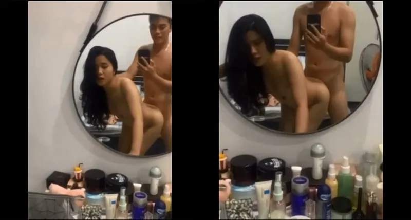 Xoạc học sinh nữ xinh như hoa trước gương